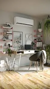 Modern mini split air handler mounted above a desk in a home office
